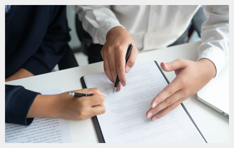 Advisor reviewing documents with clients