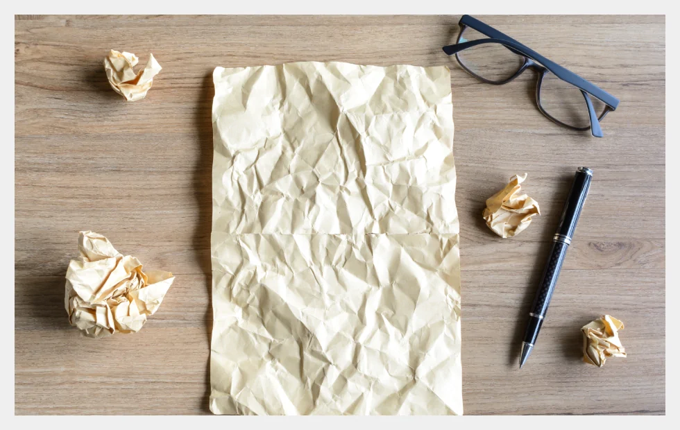 Crumpled paper rejected draft