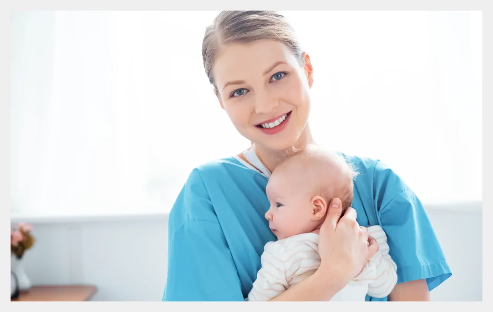 Midwife caring for newborn baby Midwife caring for newborn baby